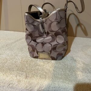 Coach purse maybe used once. In great shape no wear and tear to point out.